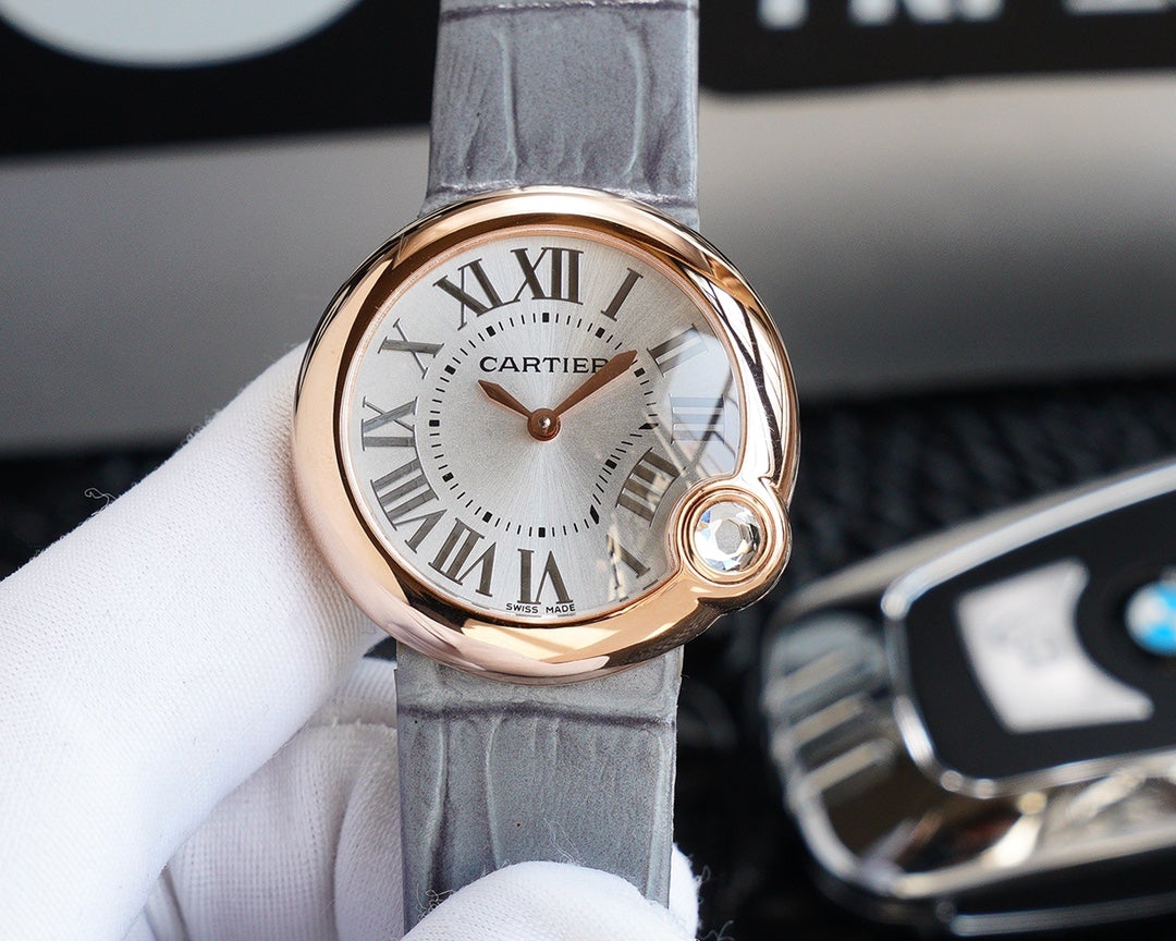 CARTIER BALLON BLANC 33MM AUTOMATIC ROSE GOLD ARABIC NUMERALS