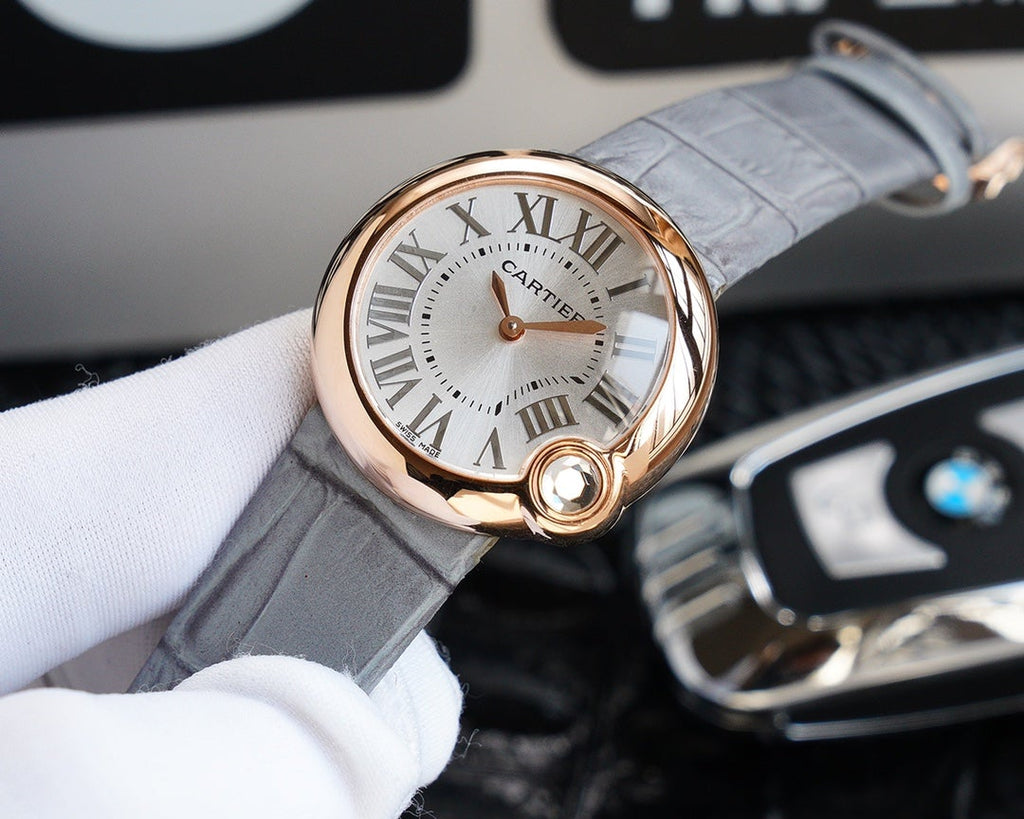 CARTIER BALLON BLANC 33MM AUTOMATIC ROSE GOLD ARABIC NUMERALS