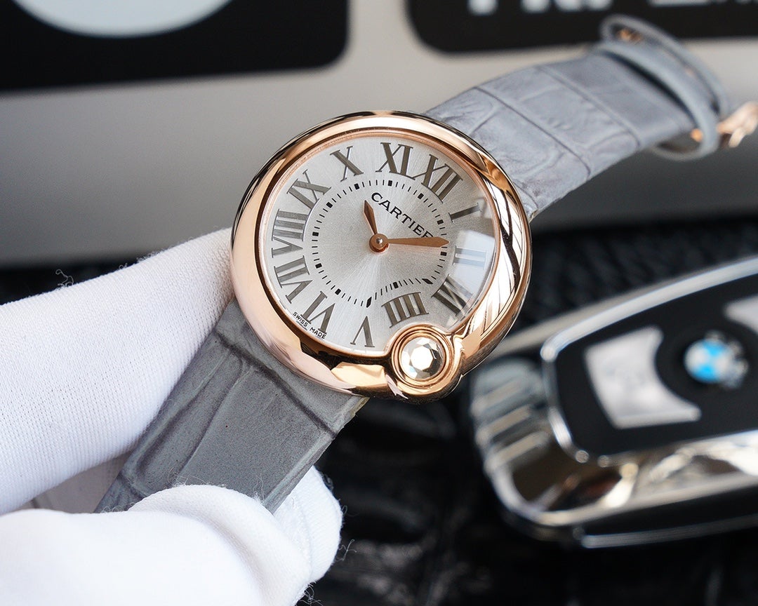 CARTIER BALLON BLANC 33MM AUTOMATIC ROSE GOLD ARABIC NUMERALS