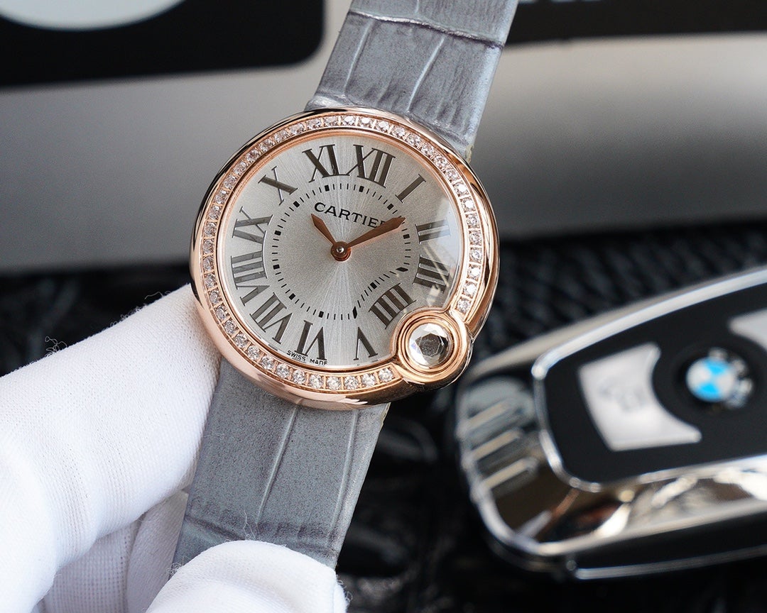 CARTIER BALLON BLANC 33MM AUTOMATIC ROSE GOLD ARABIC NUMERALS