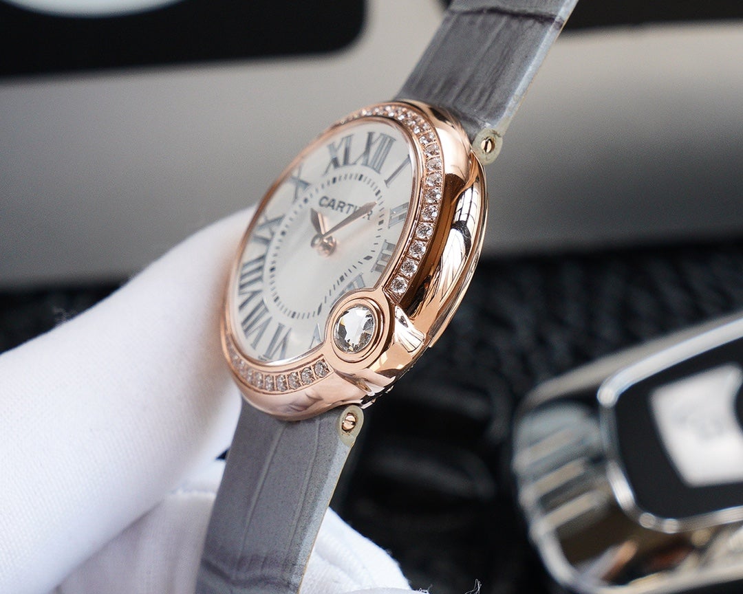 CARTIER BALLON BLANC 33MM AUTOMATIC ROSE GOLD ARABIC NUMERALS