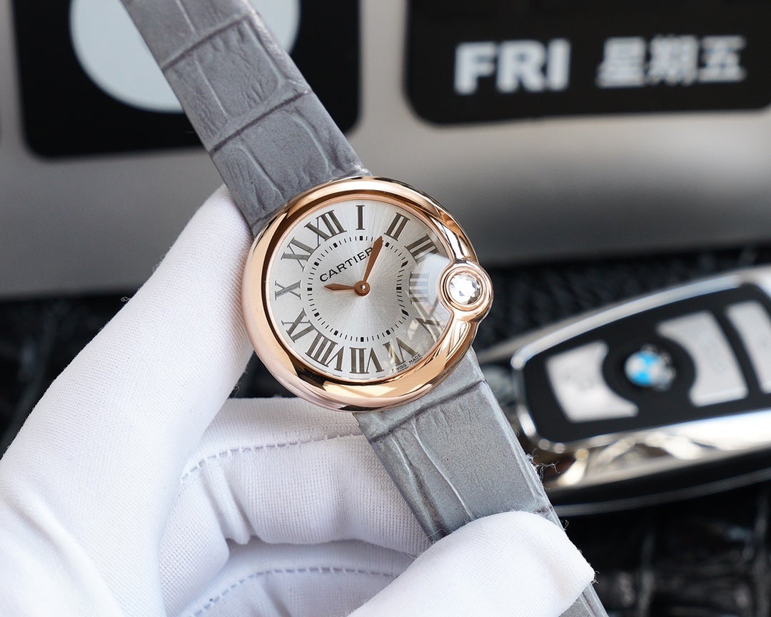CARTIER BALLON BLANC 33MM AUTOMATIC ROSE GOLD ARABIC NUMERALS