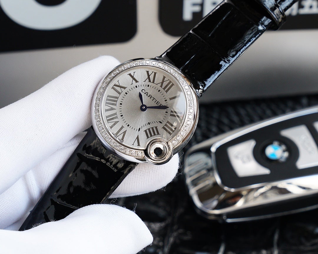 CARTIER BALLON BLANC 33MM AUTOMATIC STEEL CASE ARABIC NUMERALS