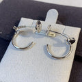 CARTIER JUSTE EARRINGS SILVER
