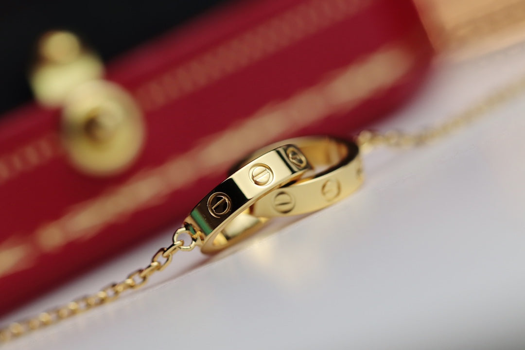 CARTIER LOVE NECKLACE DOUBLE RING GOLD