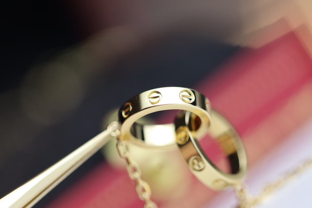 CARTIER LOVE NECKLACE DOUBLE RING GOLD