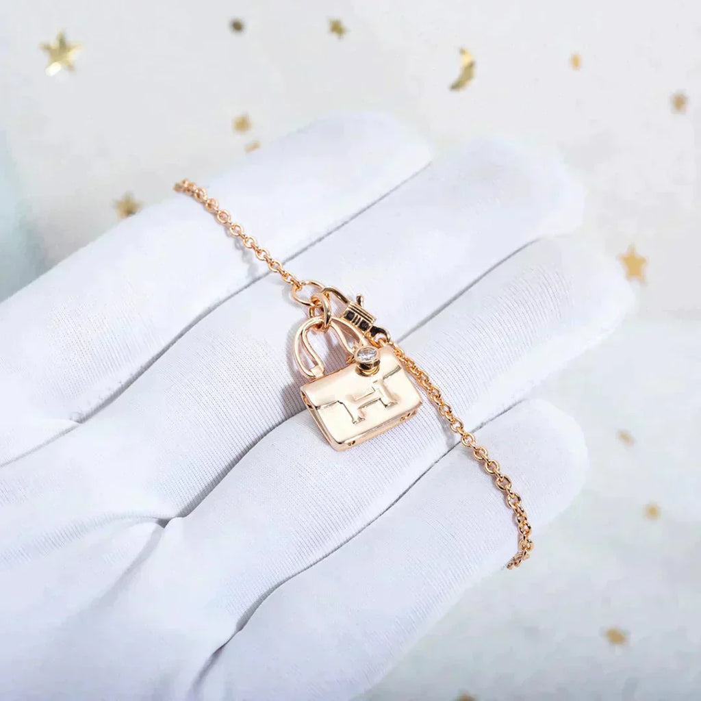 HERMES AMULETTE PEDANT ROSE GOLD NECKLACE