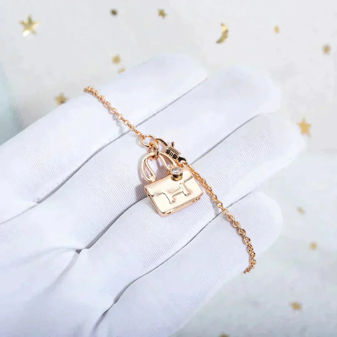 HERMES AMULETTE PEDANT ROSE GOLD NECKLACE