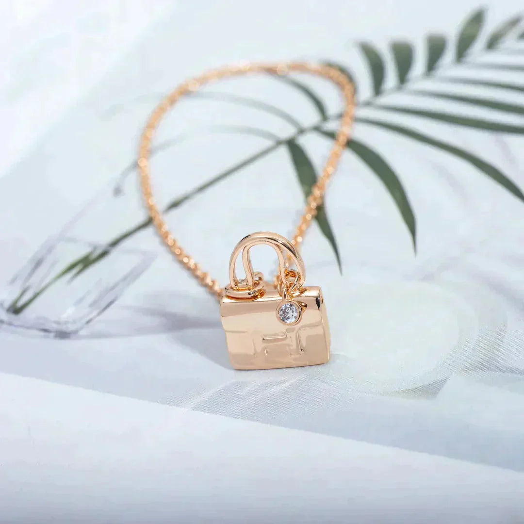 HERMES AMULETTE PEDANT ROSE GOLD NECKLACE