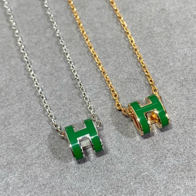 HERMES POP H GREEN NECKLACE SILVER AND GOLD